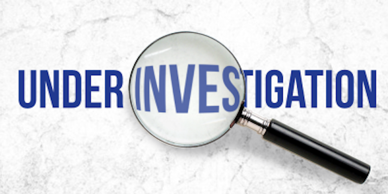 UNDER INVESTIGATION LOGO